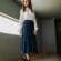 Woman Wearing White Long-sleeved Shirt and Blue Skirt